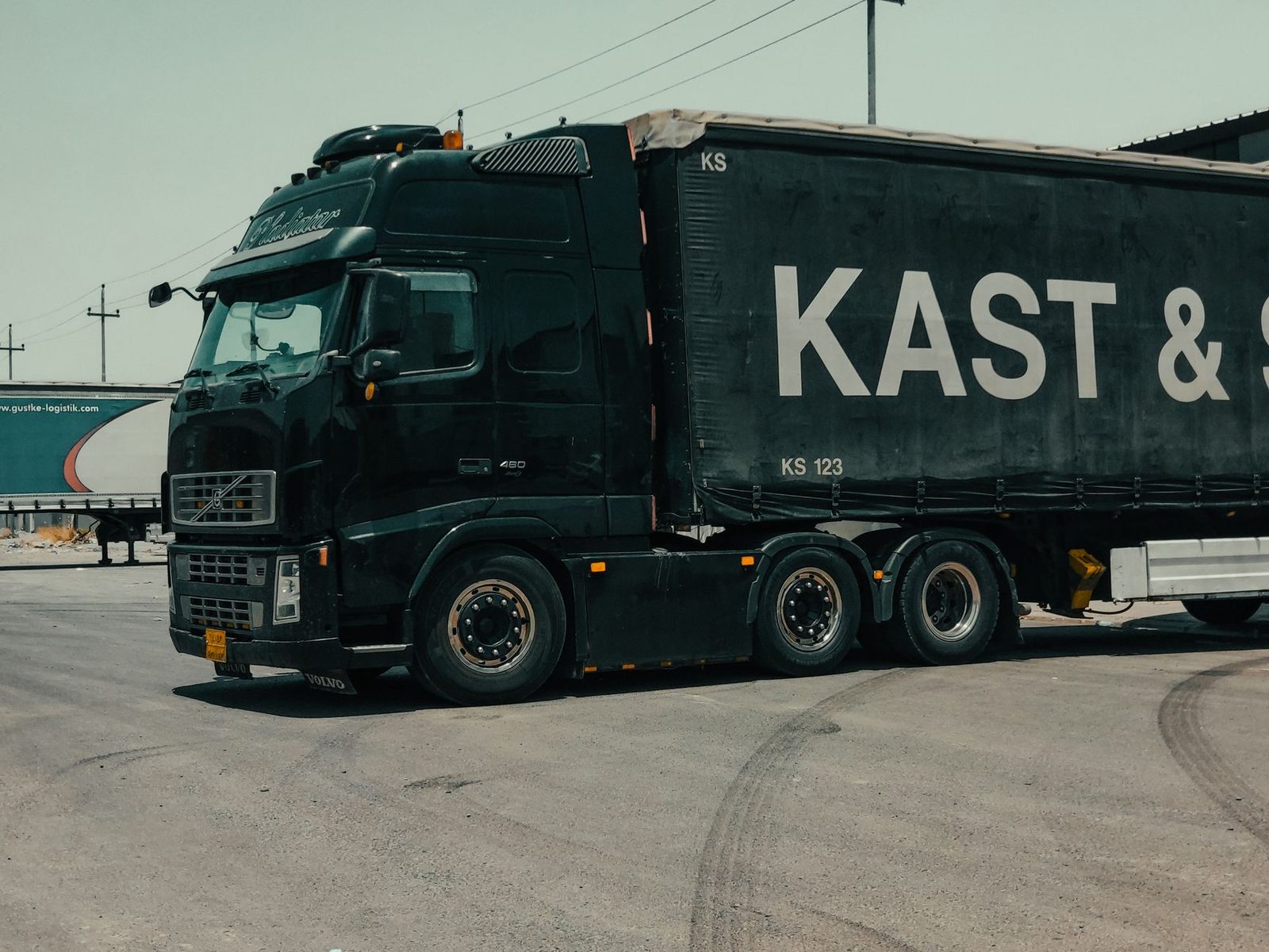 A large industrial truck parked on a city street.